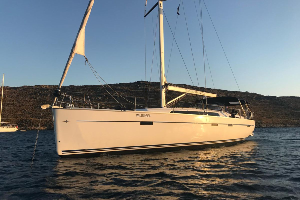 Exterior view of Wild At Sea, a Bavaria Cruiser 51 sailboat at Lavreotiki Municipal Unit, Greece