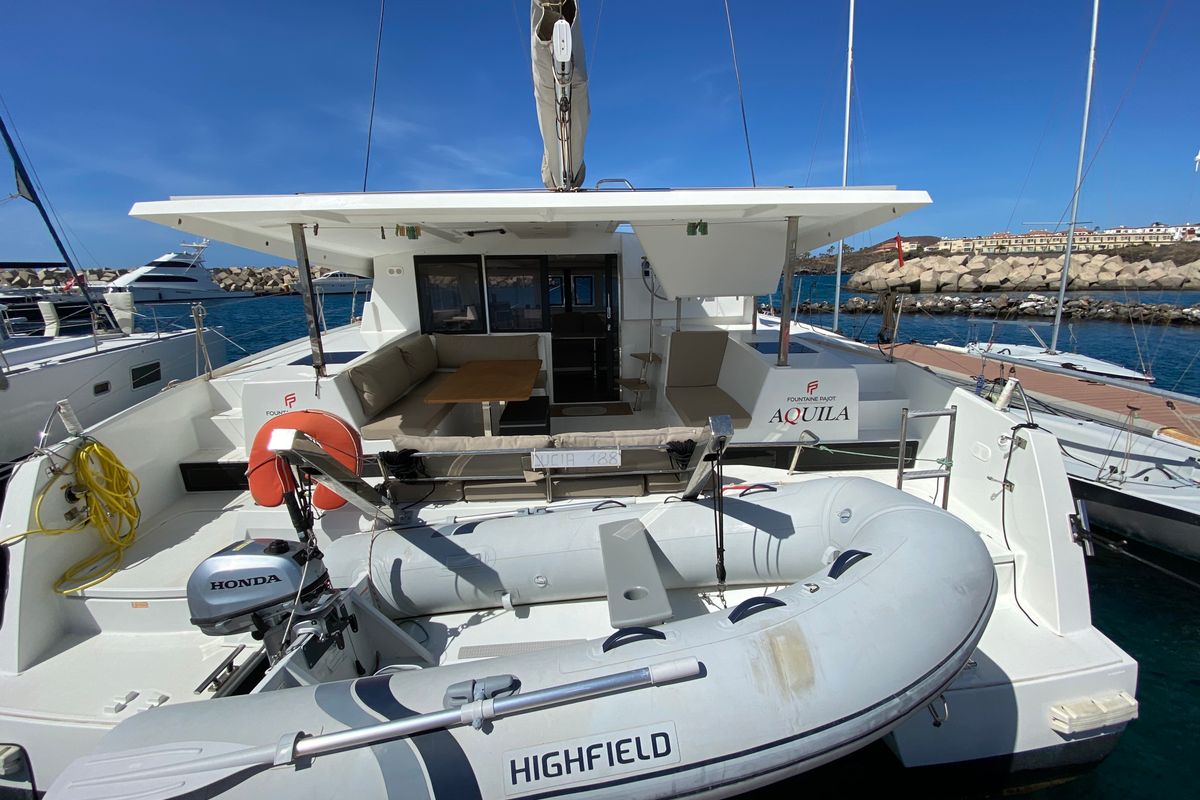 Exterior view of Aquila, a Fountaine Pajot Lucia 40 catamaran at Ibiza, Spain