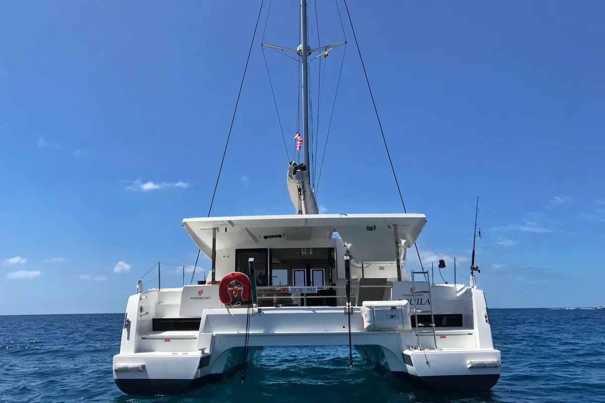Exterior view of Aquila, a Fountaine Pajot Lucia 40 catamaran at Ibiza, Spain
