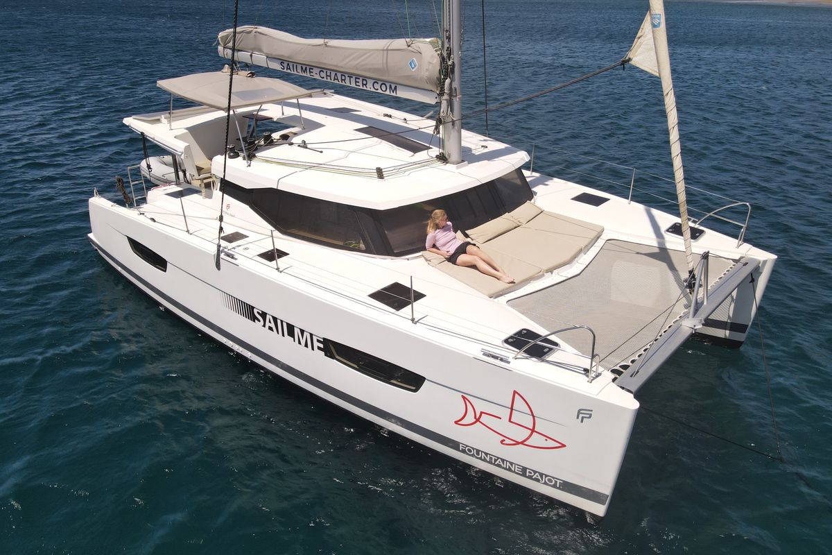 Exterior view of Aquila, a Fountaine Pajot Lucia 40 catamaran at Ibiza, Spain