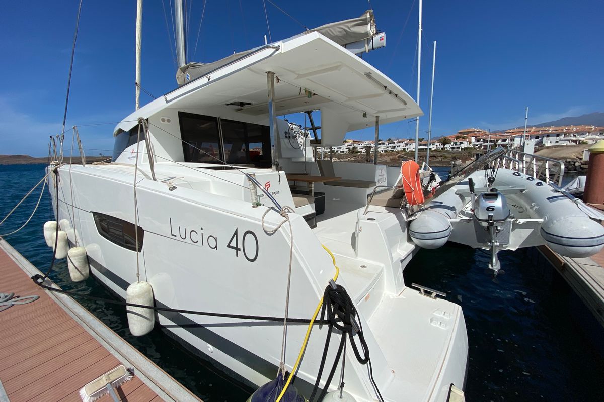 Exterior view of Aquila, a Fountaine Pajot Lucia 40 catamaran at Ibiza, Spain