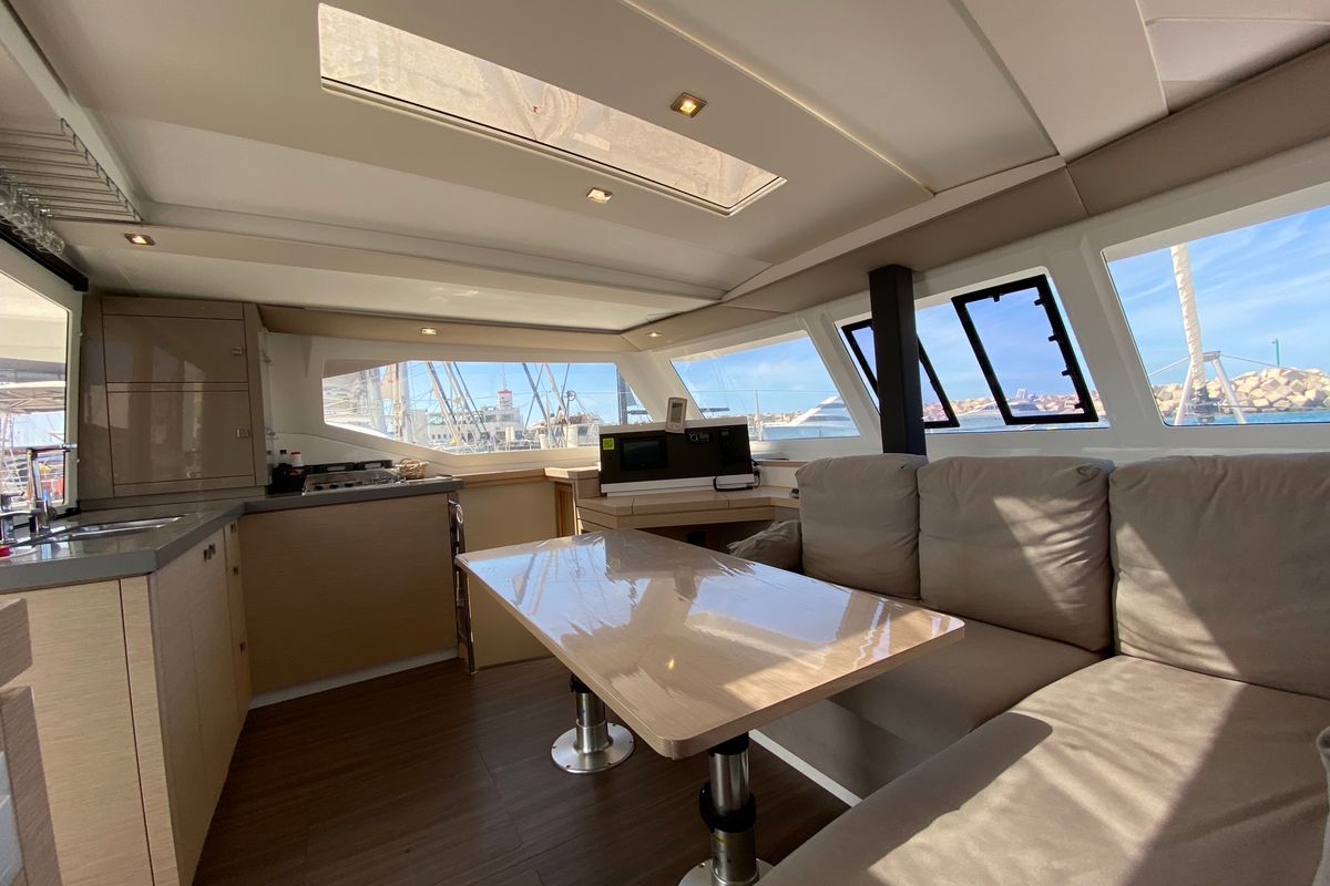Salon of Aquila, a Fountaine Pajot Lucia 40 catamaran at Ibiza, Spain