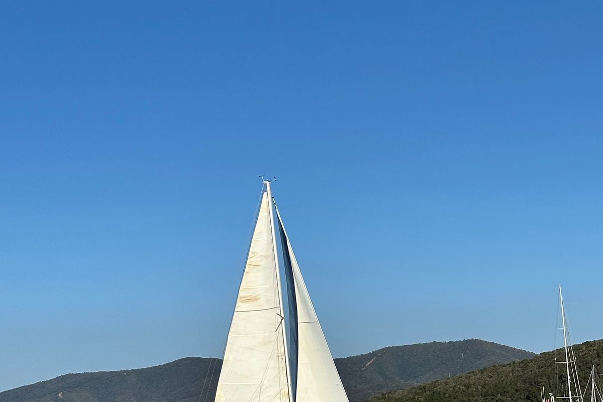 Exterior view of Cassiopea, a Beneteau Oceanis 323 sailboat at Punta Ala, Italy