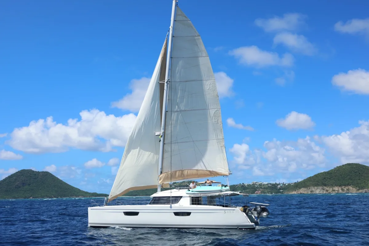 Exterior view of Purpose, a Fountaine Pajot Saba 50 catamaran at Grand Anse, Grenada