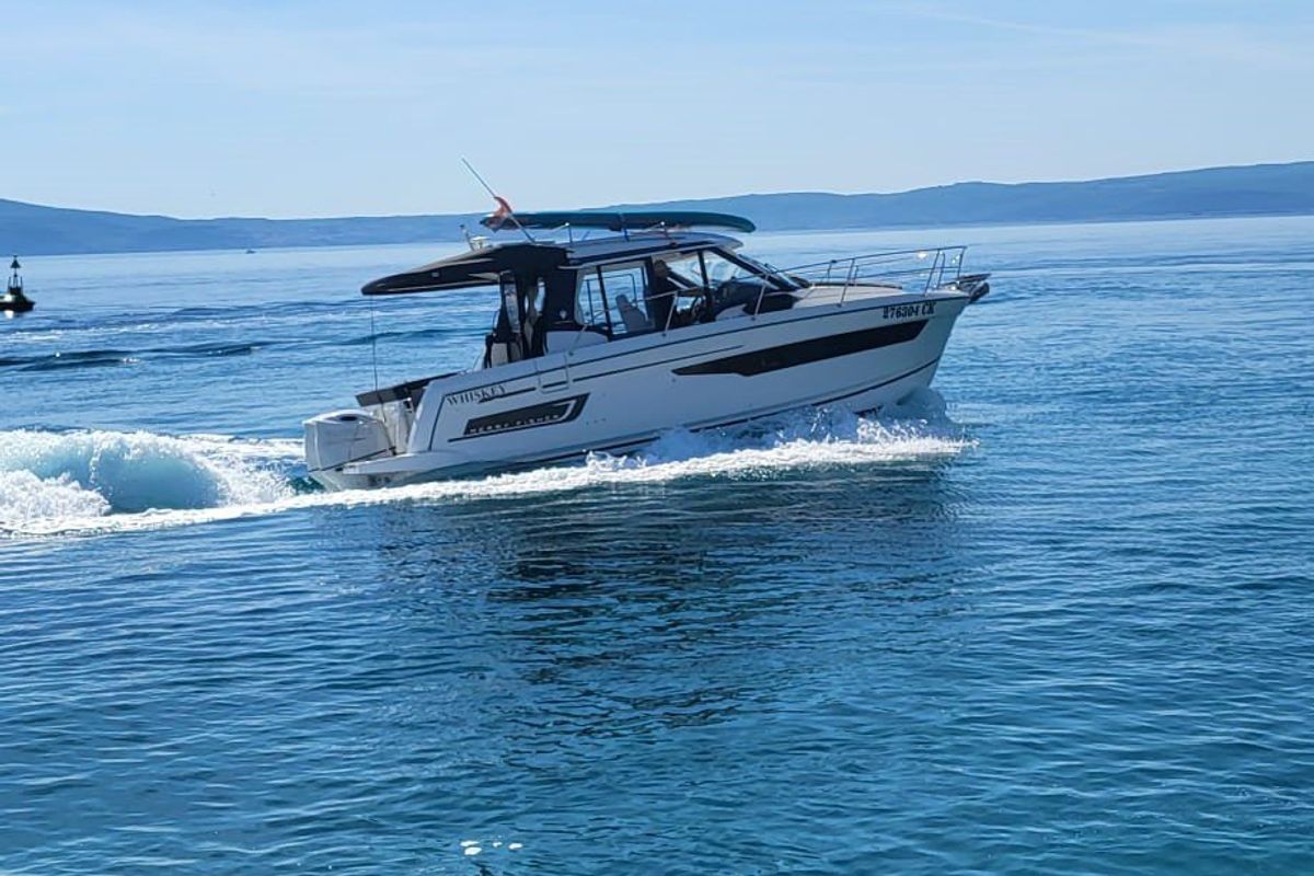 Exterior view of Whiskey, a Jeanneau Merry Fisher 895 motorboat at Novi Vinodolski, Croatia