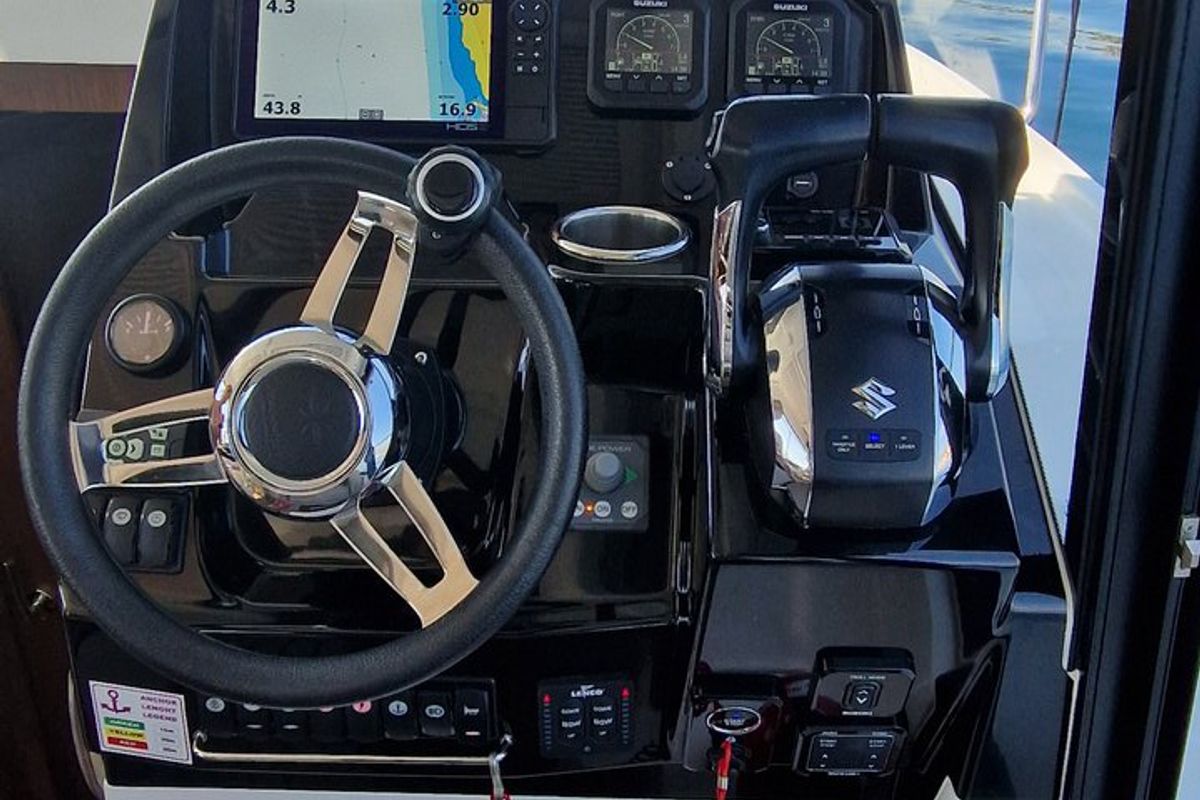 Cockpit of Whiskey, a Jeanneau Merry Fisher 895 motorboat at Novi Vinodolski, Croatia