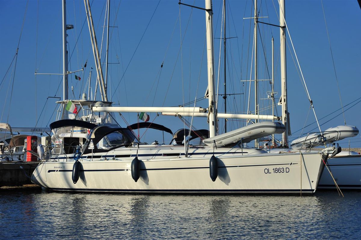 Exterior view of Tommy, a Bavaria 38 sailboat at Olbia, Italy
