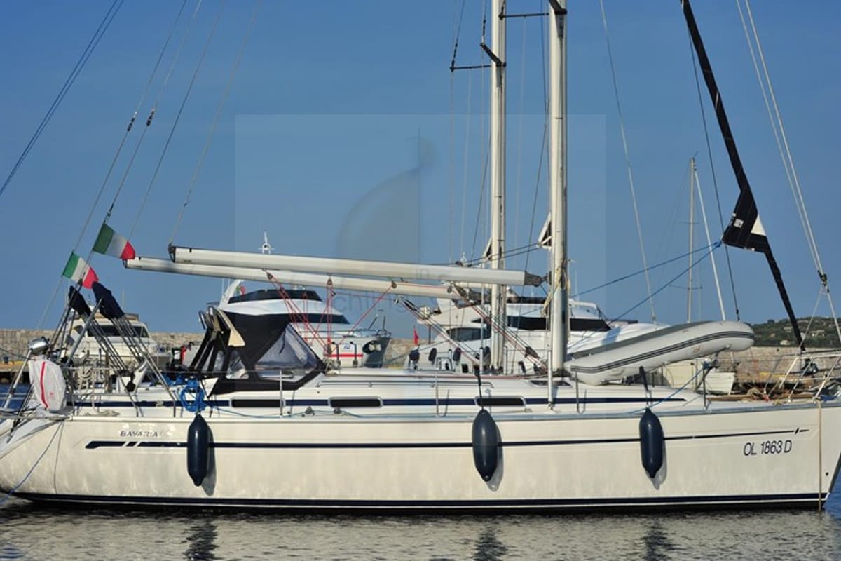 Exterior view of Tommy, a Bavaria 38 sailboat at Olbia, Italy