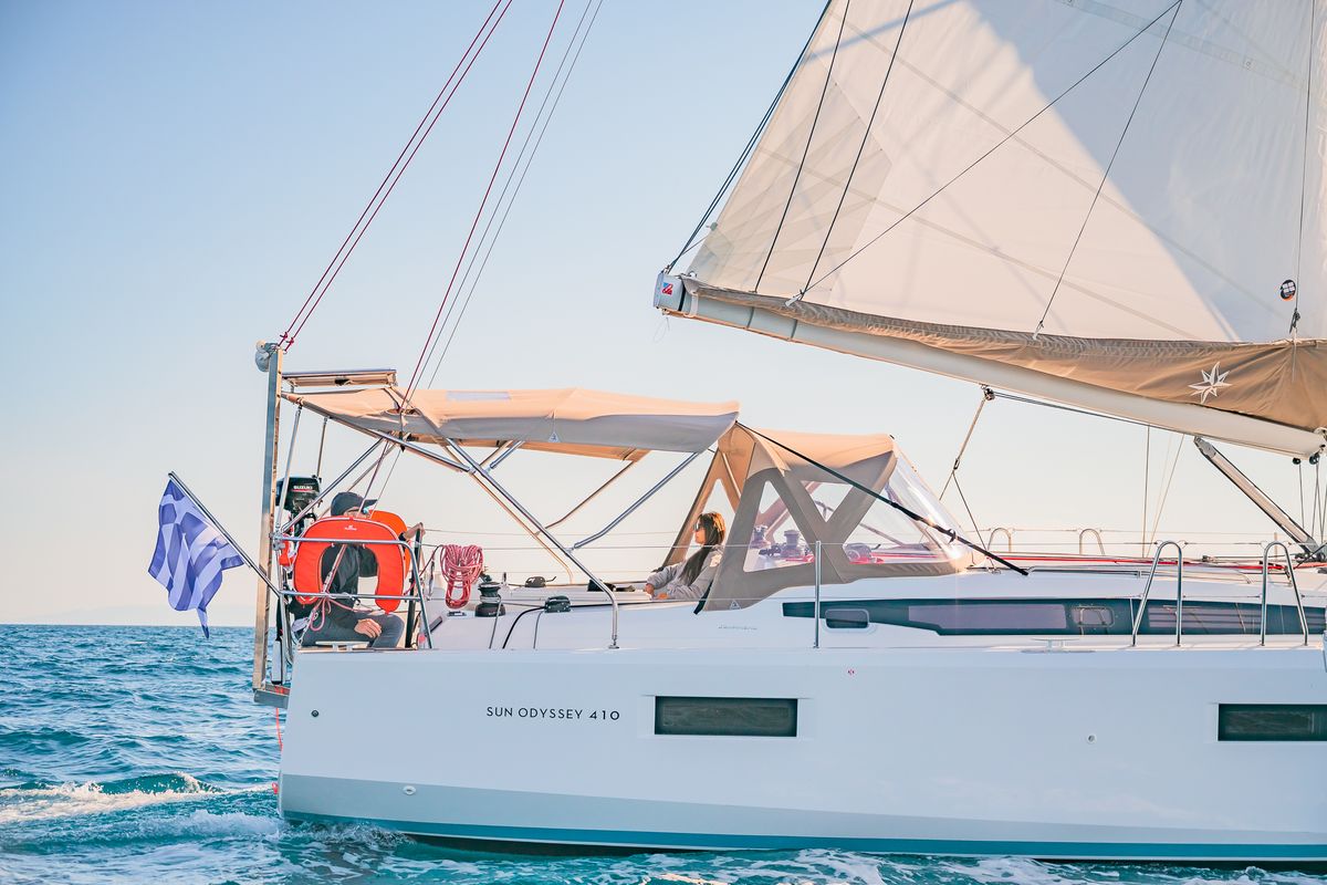 Exterior view of Emotion, a Jeanneau Sun Odyssey 410 sailboat at Lavreotiki Municipal Unit, Greece