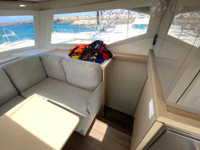 Salon of Papaya, a Fountaine Pajot Lucia 40 catamaran at Ibiza, Spain