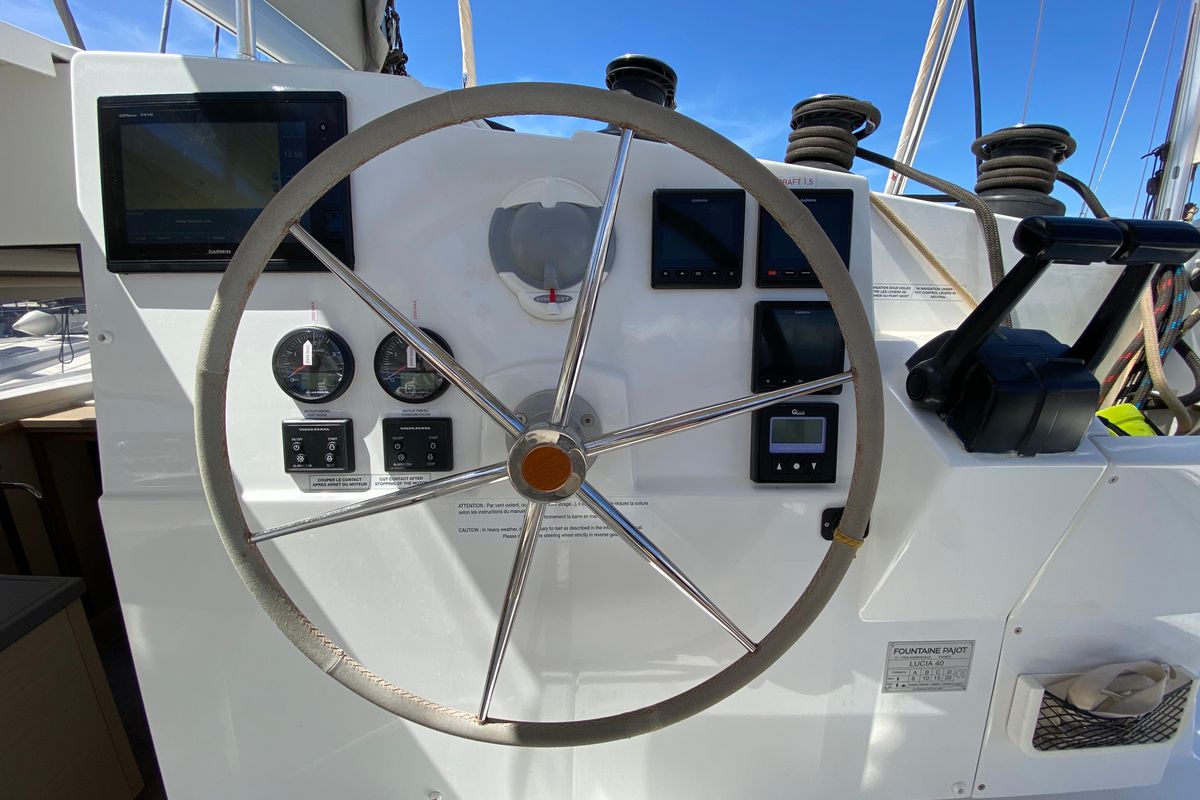 Cockpit of Papaya, a Fountaine Pajot Lucia 40 catamaran at Ibiza, Spain