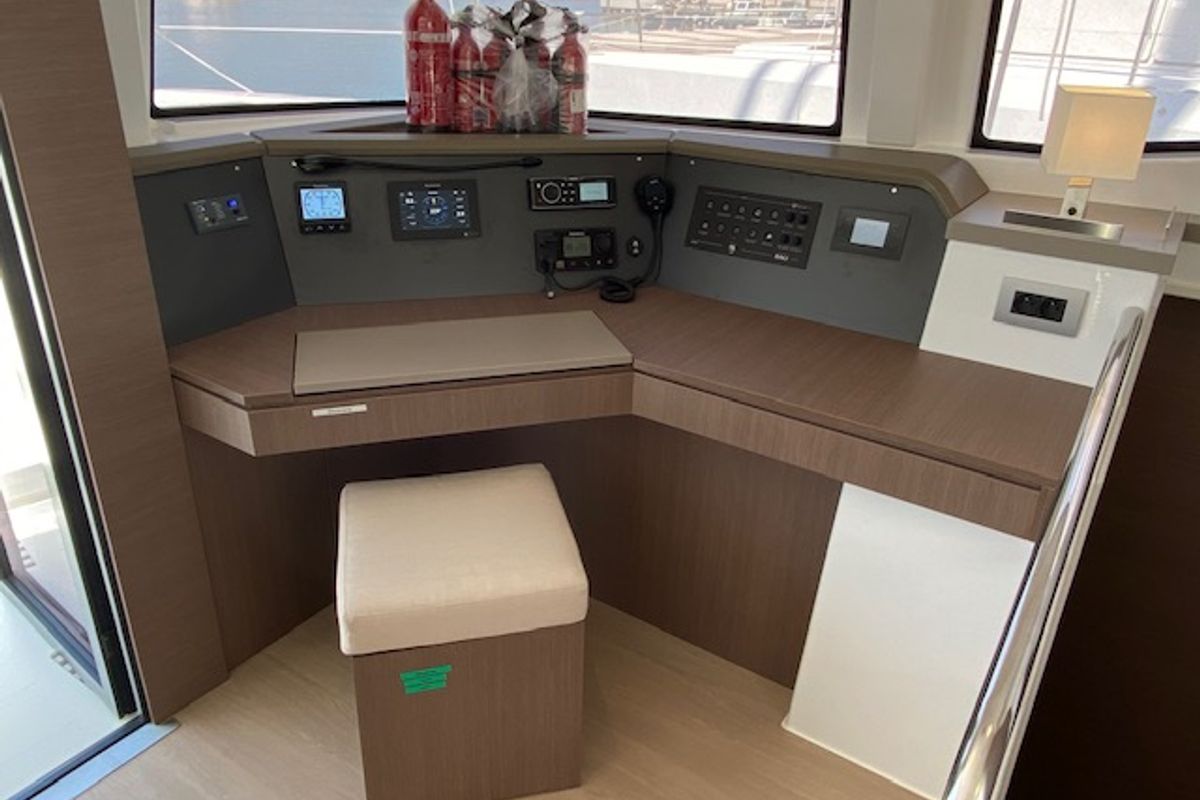 Cockpit of Mira, a Bali 4.6 catamaran at Olbia, Italy