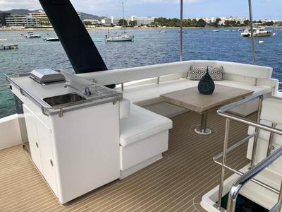 Deck of LEOPARD 43 PAULINE POWERCAT , a Leopard 43 PC catamaran at Sant Antoni de Portmany, Spain