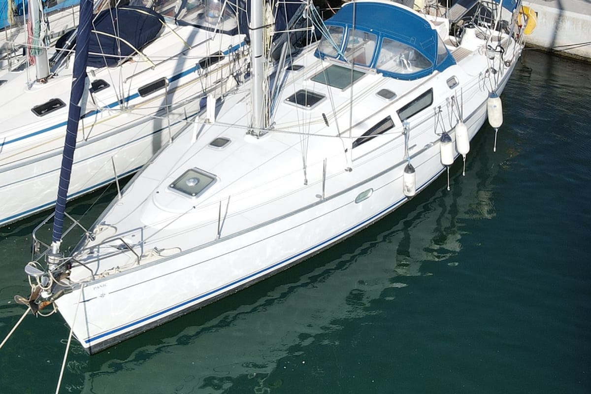 Exterior view of Panic, a Jeanneau Sun Odyssey 40 sailboat at Athens, Marina Delta Kallithea, Greece