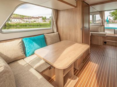Salon of 950E-32, a Pénichette 950E motorboat at Scey-sur-Saône-et-Saint-Albin, France