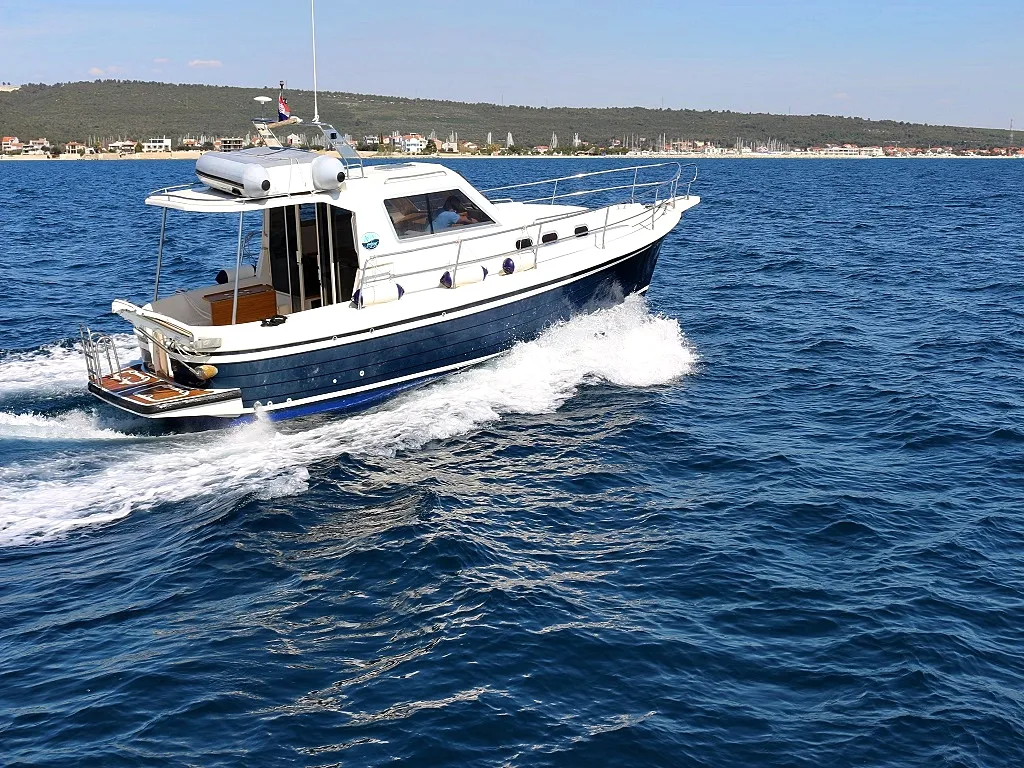 Exterior view of Vella, a SAS - Vektor Adria 1002 Vektor motorboat at Općina Sukošan, Croatia