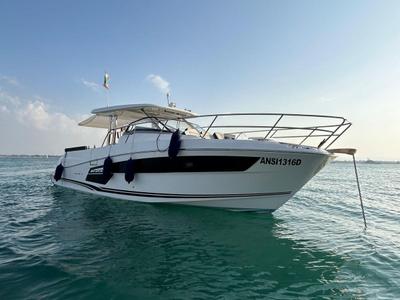 Exterior view of Ansimaste, a Jeanneau Cap Camarat 12.5 motorboat at Syracuse, Italy