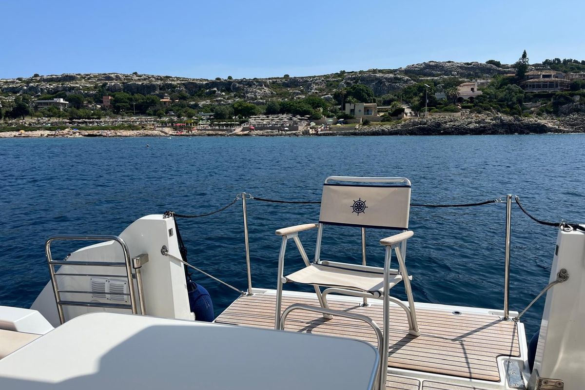 Exterior view of Ansimaste, a Jeanneau Cap Camarat 12.5 motorboat at Syracuse, Italy