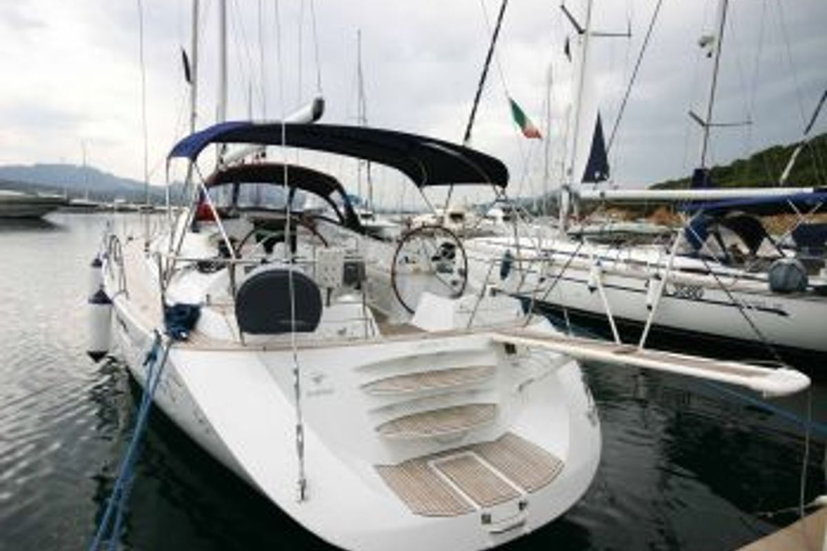 Exterior view of Cassiopea II, a Jeanneau Sun Odyssey 54DS sailboat at Olbia, Italy