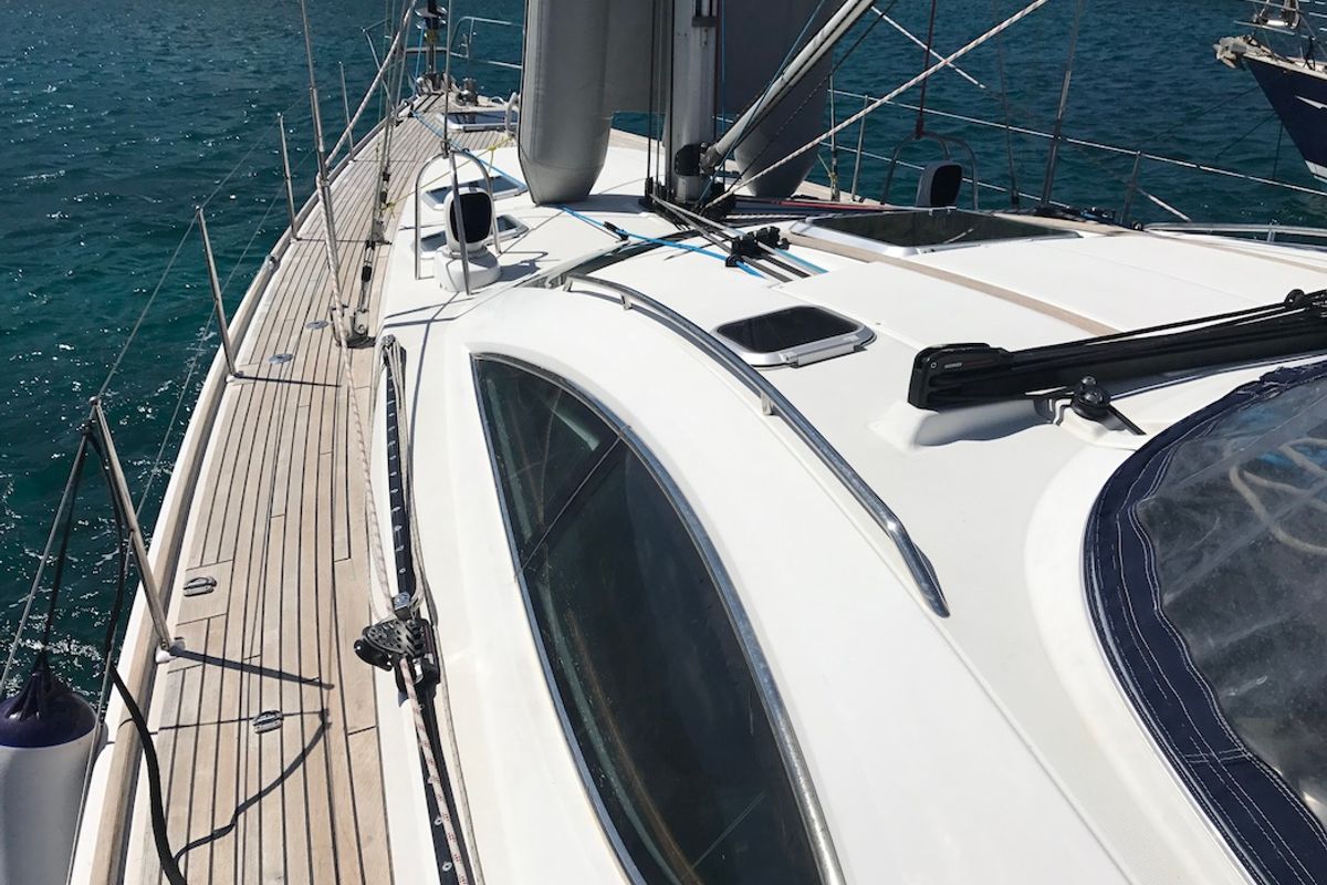 Deck of Cassiopea II, a Jeanneau Sun Odyssey 54DS sailboat at Olbia, Italy
