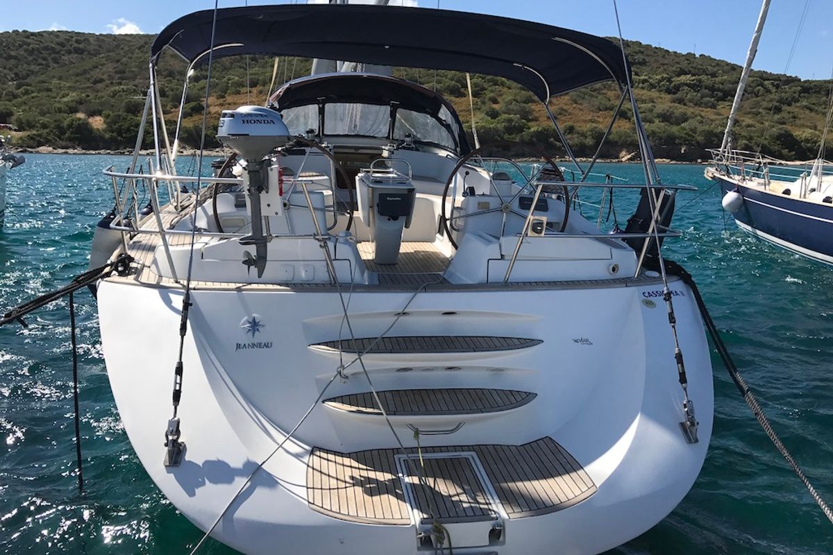 Exterior view of Cassiopea II, a Jeanneau Sun Odyssey 54DS sailboat at Olbia, Italy