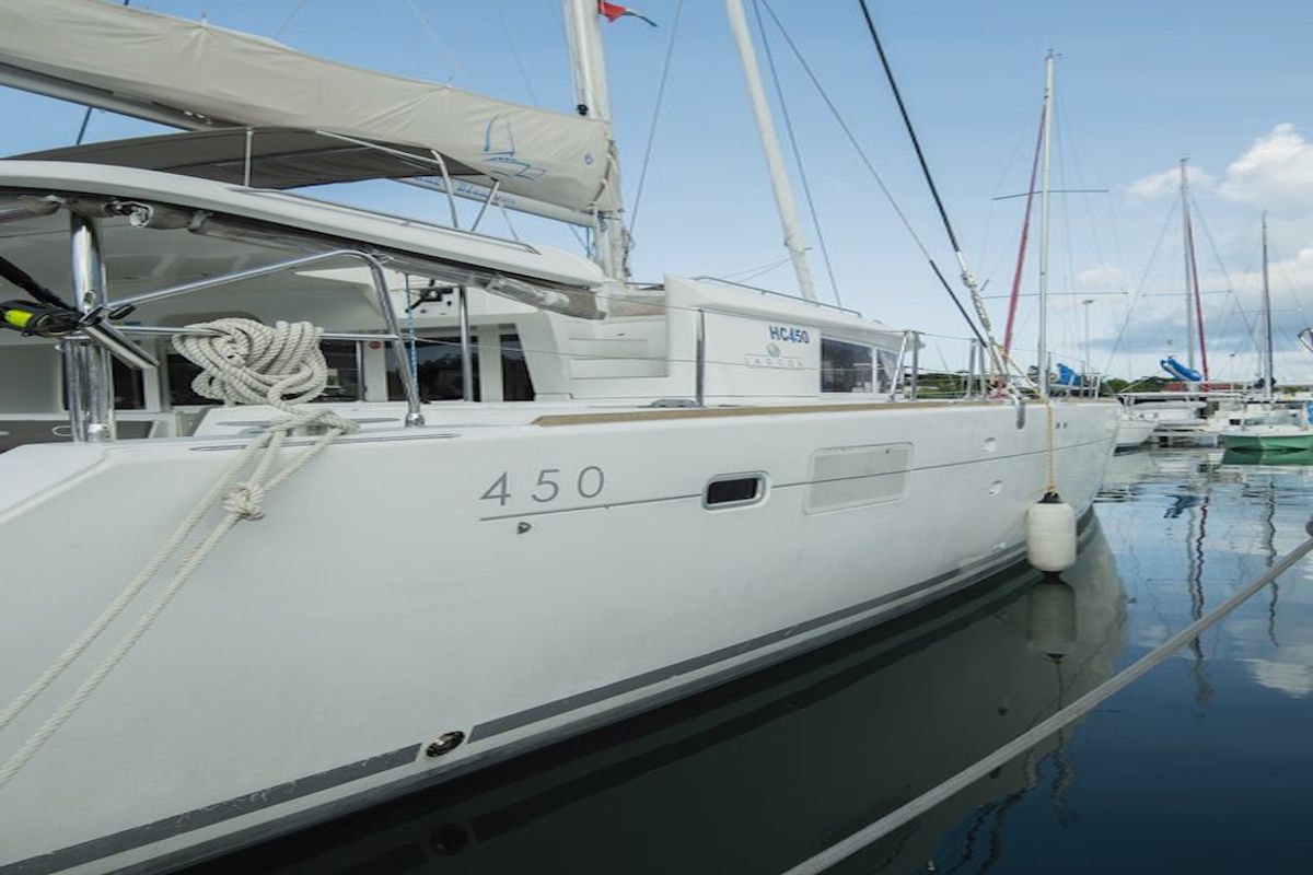 Exterior view of Muzikal, a Lagoon 450 catamaran at Krishna nagar village, India