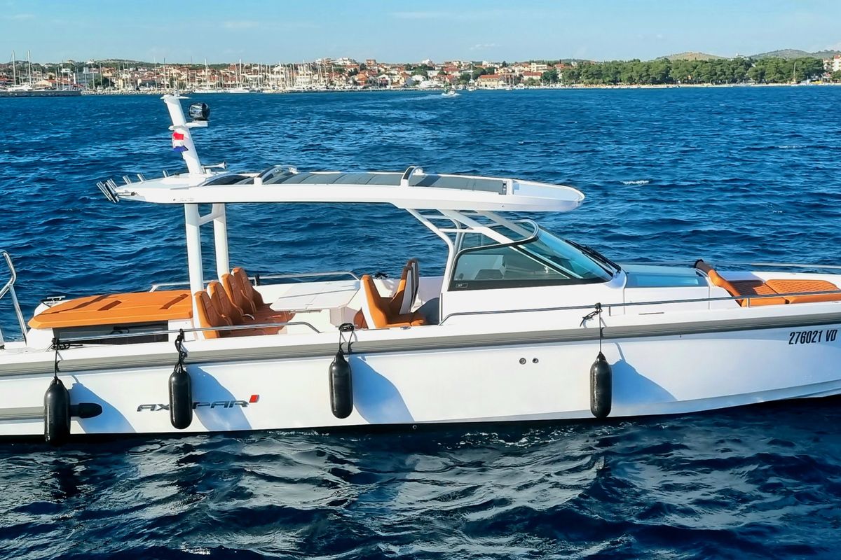 Exterior view of Axe, a Axopar 37 Sun Top motorboat at Grad Vodice, Croatia