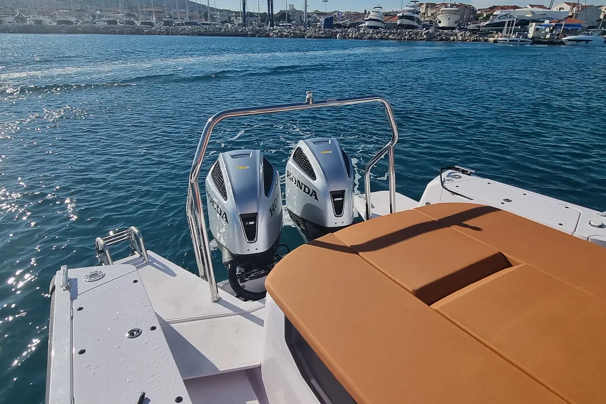 Axe, a Axopar 37 Sun Top motorboat at Grad Vodice, Croatia