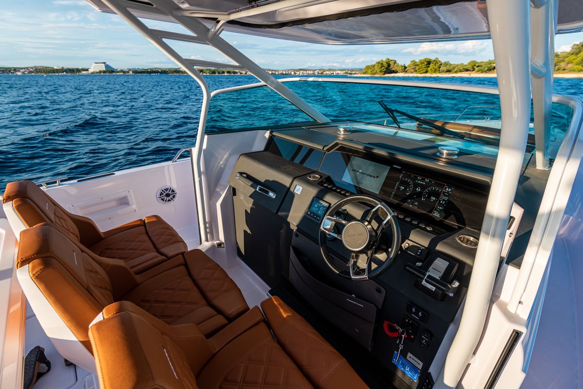 Cockpit of Axe, a Axopar 37  Sun Top motorboat at Grad Vodice, Croatia