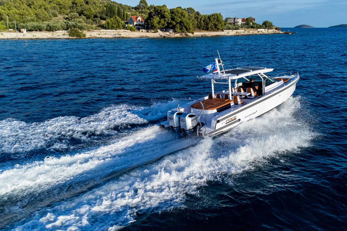 Exterior view of Axe, a Axopar 37  Sun Top motorboat at Grad Vodice, Croatia