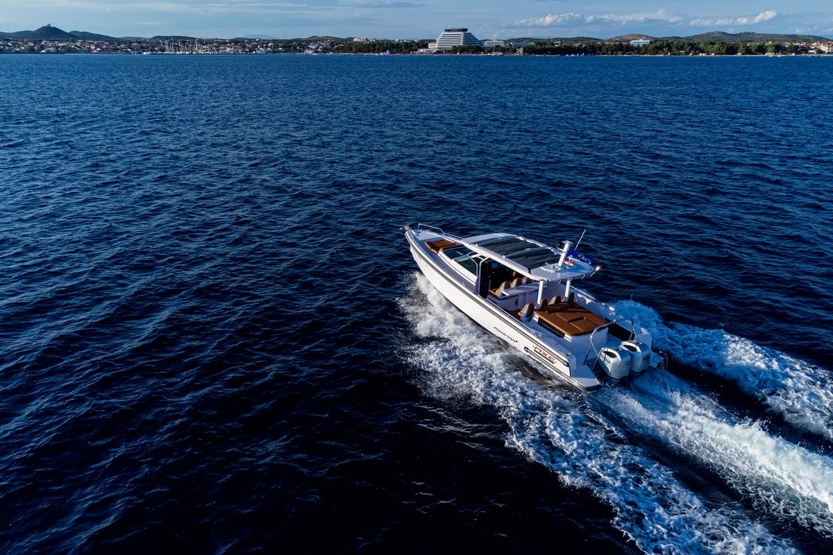 Exterior view of Axe, a Axopar 37  Sun Top motorboat at Grad Vodice, Croatia