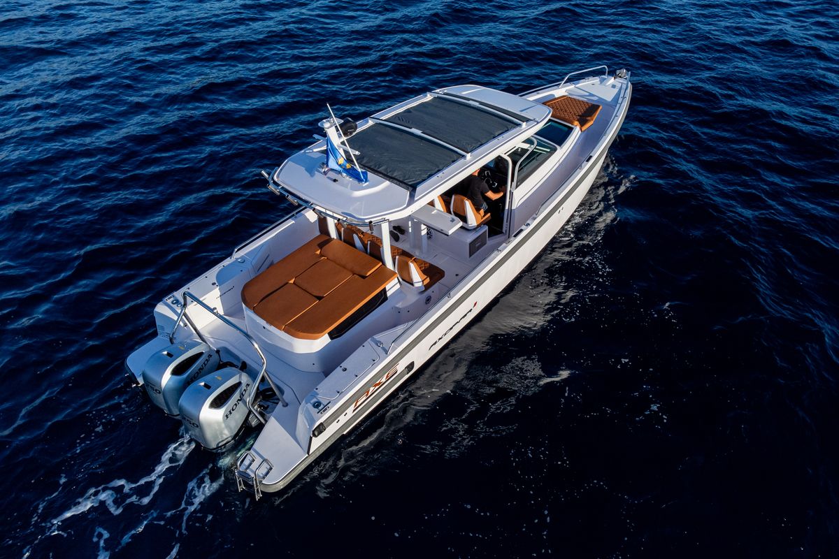 Exterior view of Axe, a Axopar 37 Sun Top motorboat at Grad Vodice, Croatia