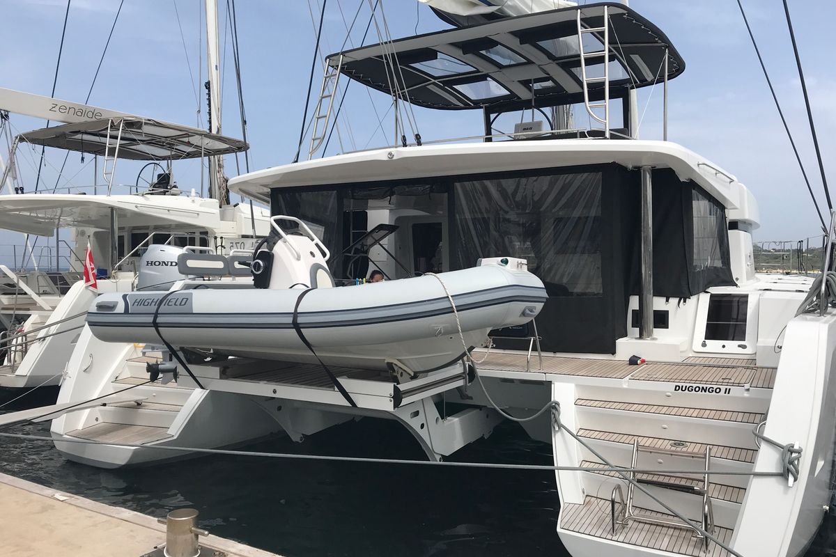 Exterior view of Dugongo II, a Lagoon 52 catamaran at Olbia, Italy