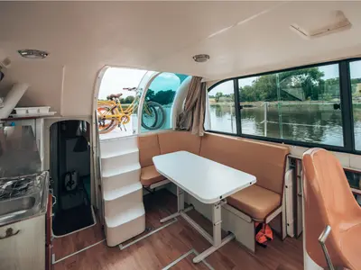 Salon of Allegro II, a Nicols Confort 900 DP motorboat at Grez-Neuville, France