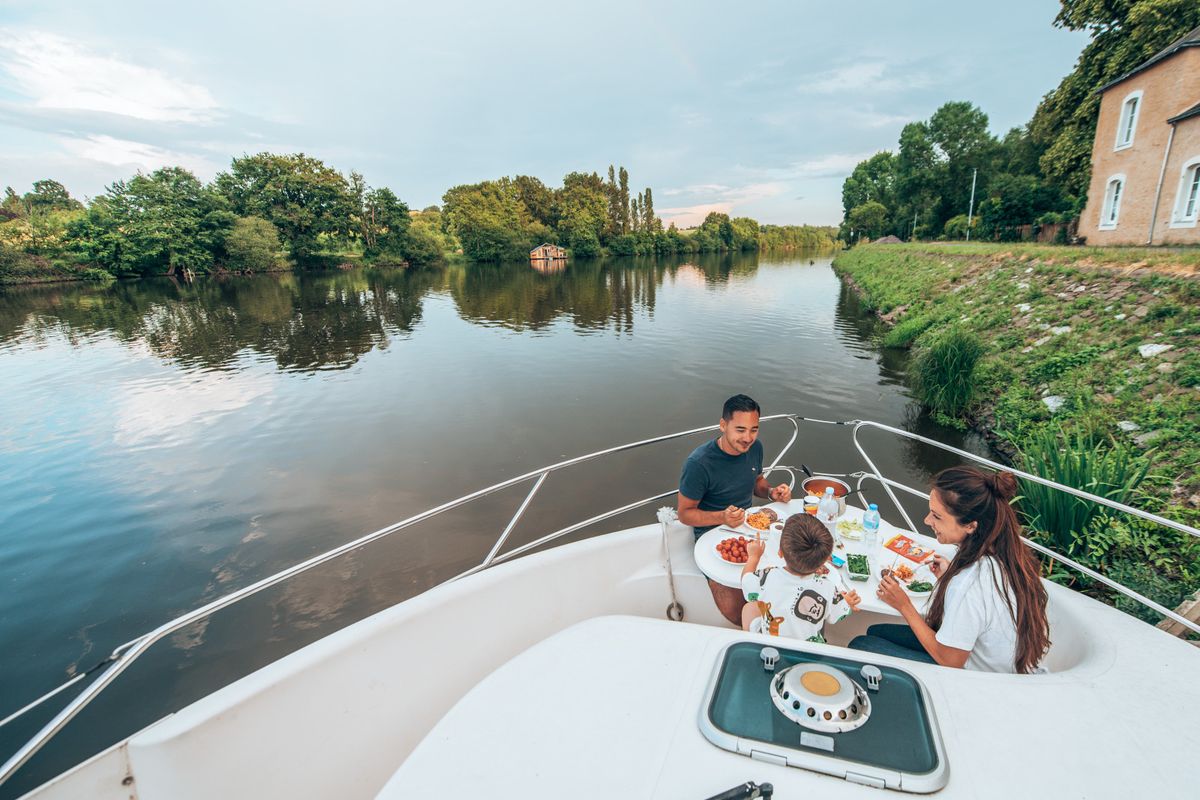 Deck of Allegro II, a Nicols Confort 900 DP motorboat at Grez-Neuville, France