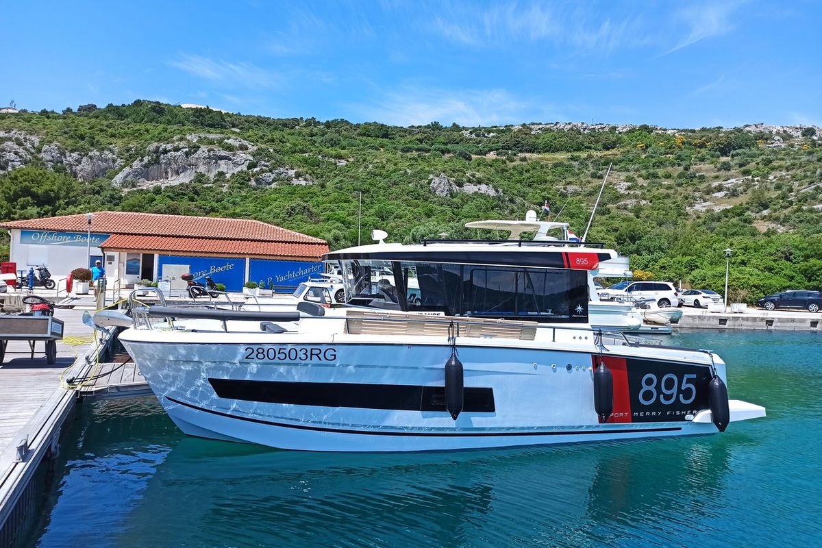 Exterior view of Surprise, a Jeanneau Merry Fisher 895 Sport Offshore motorboat at Punat, Croatia