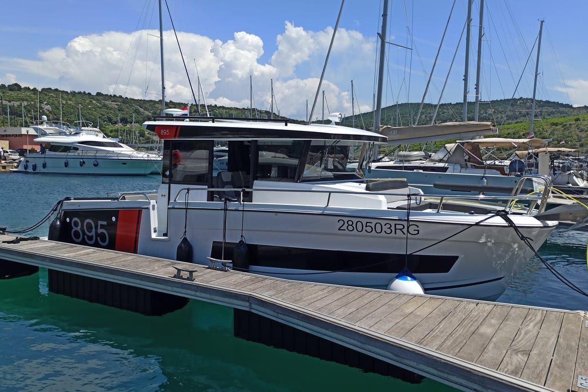 Exterior view of Surprise, a Jeanneau Merry Fisher 895 Sport Offshore motorboat at Punat, Croatia