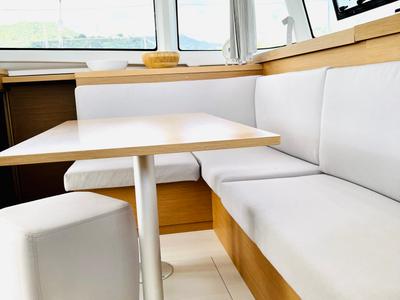 Salon of Moana Mallorca Crewed, a Excess 11 catamaran at Port d'Andratx, Spain