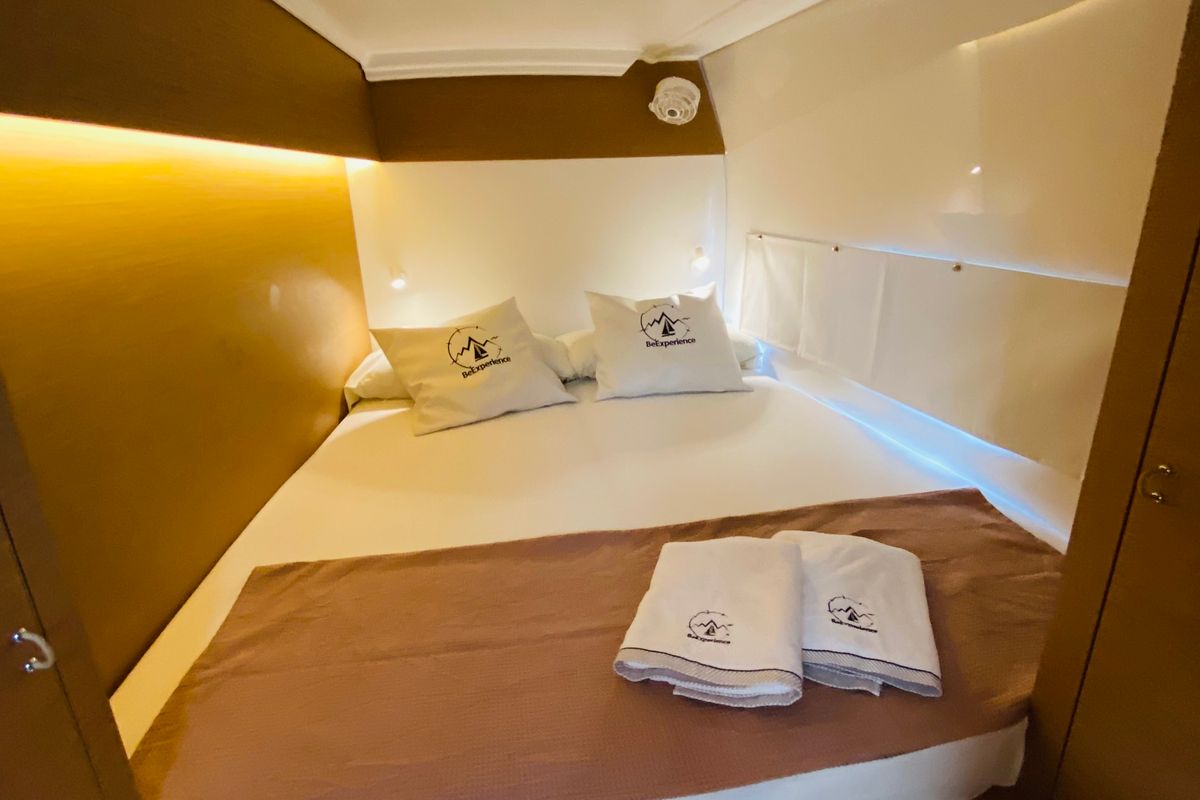 Cabin on Moana Mallorca Crewed, a Excess 11 catamaran at Port d'Andratx, Spain