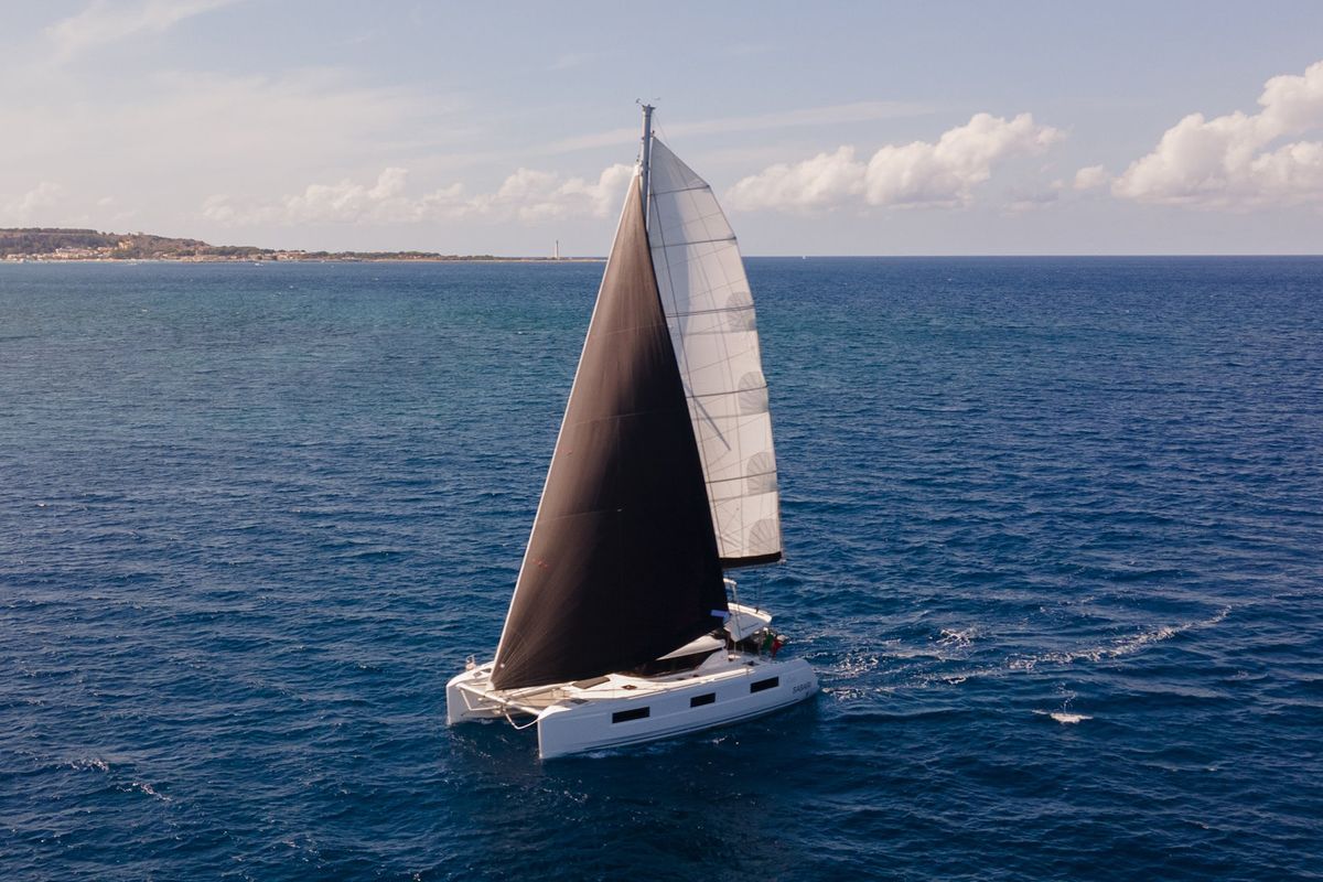 Exterior view of Sabari, a Lagoon 46 catamaran at Olbia, Italy