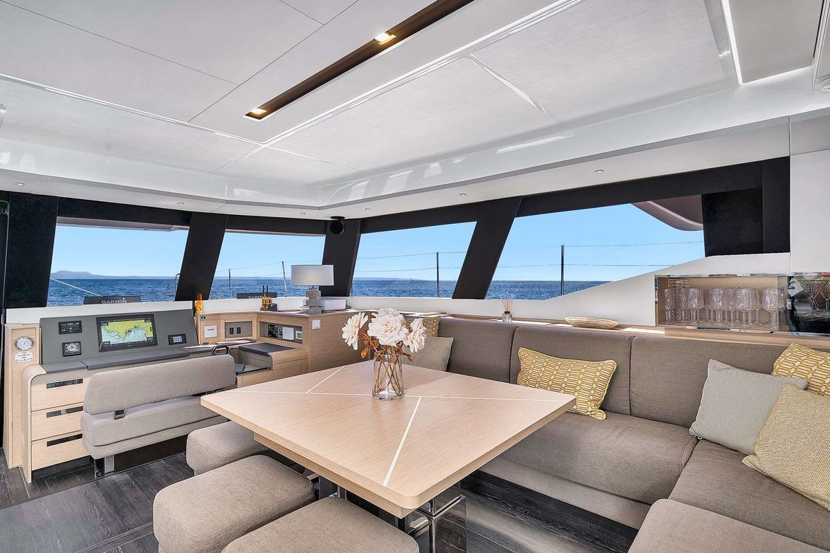 Salon of NEOW, a Fountaine Pajot Alegria 67 catamaran at Cannes, France