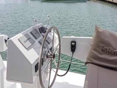 Cockpit of Lalena, a Fountaine Pajot Astréa 42 catamaran at Castellammare di Stabia, Italy