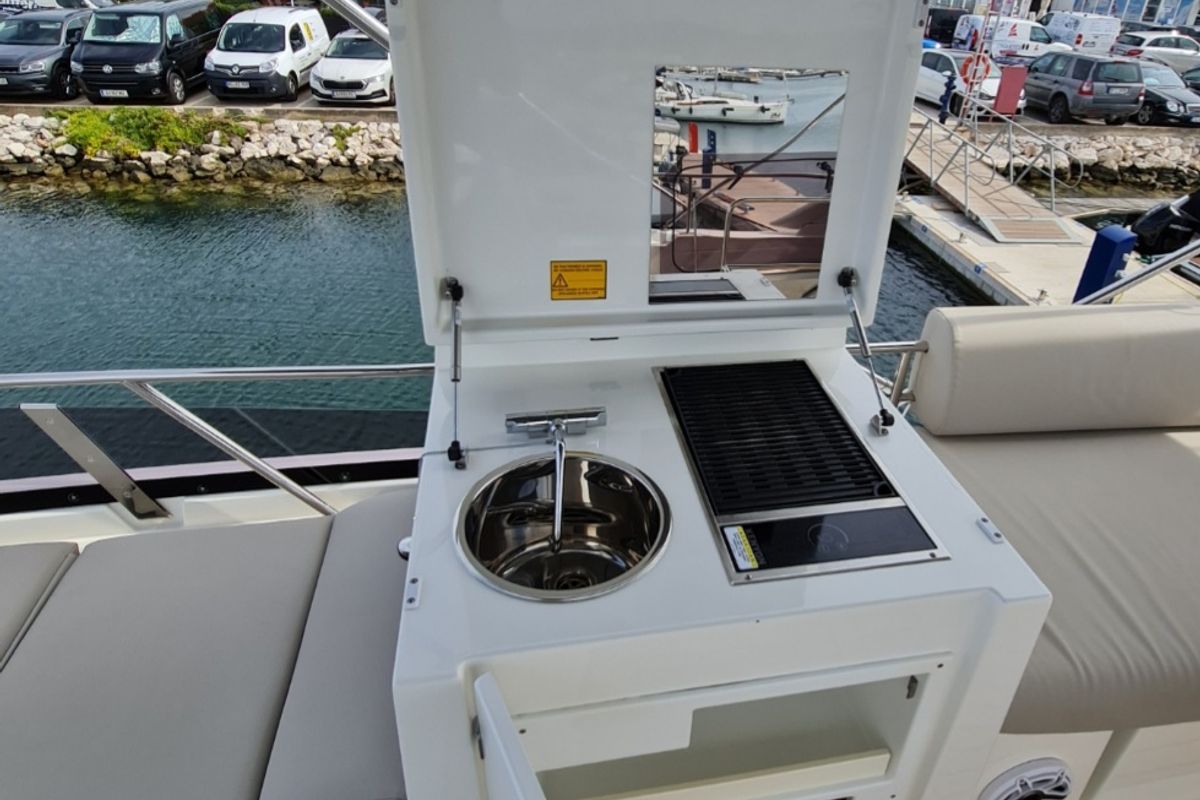 Deck of Ferus, a Jeanneau Prestige 460 Fly yacht at Grad Biograd na Moru, Croatia