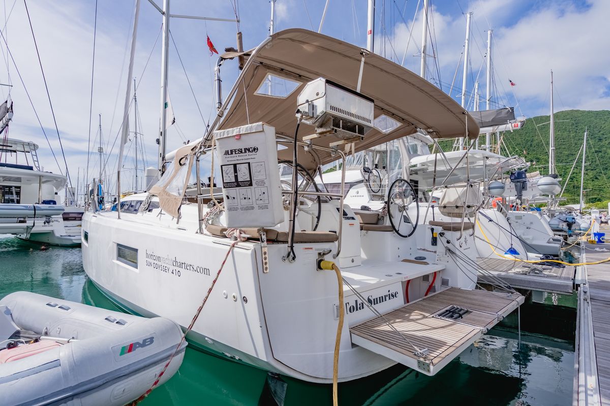 Exterior view of Tola Sunrise, a Jeanneau Sun Odyssey 410 sailboat at Road Town, British Virgin Islands