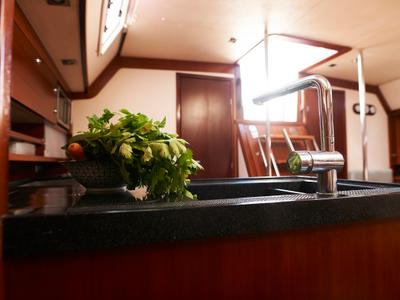 Galley of Yannis 65 s, a Hanse Yachts Hanse 540e sailboat at Milazzo, Italy