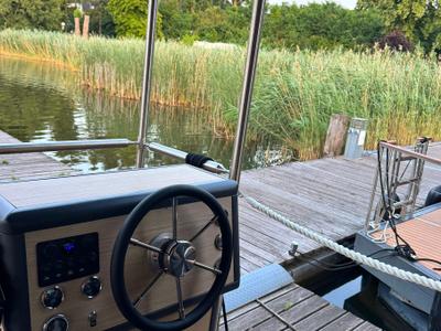 Cockpit of Roxy, a Woma D13 motorboat at Fürstenberg/Havel, Germany