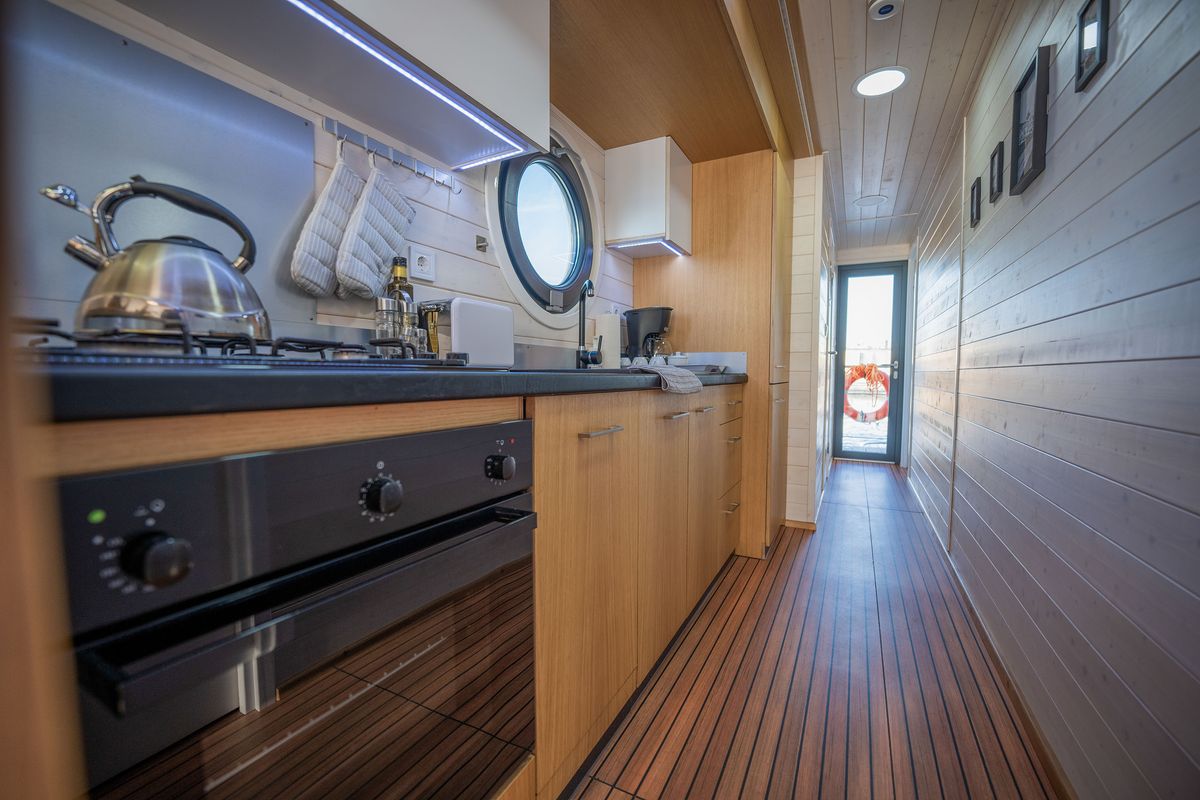 Galley of Miami, a Woma D13 motorboat at Fürstenberg/Havel, Germany