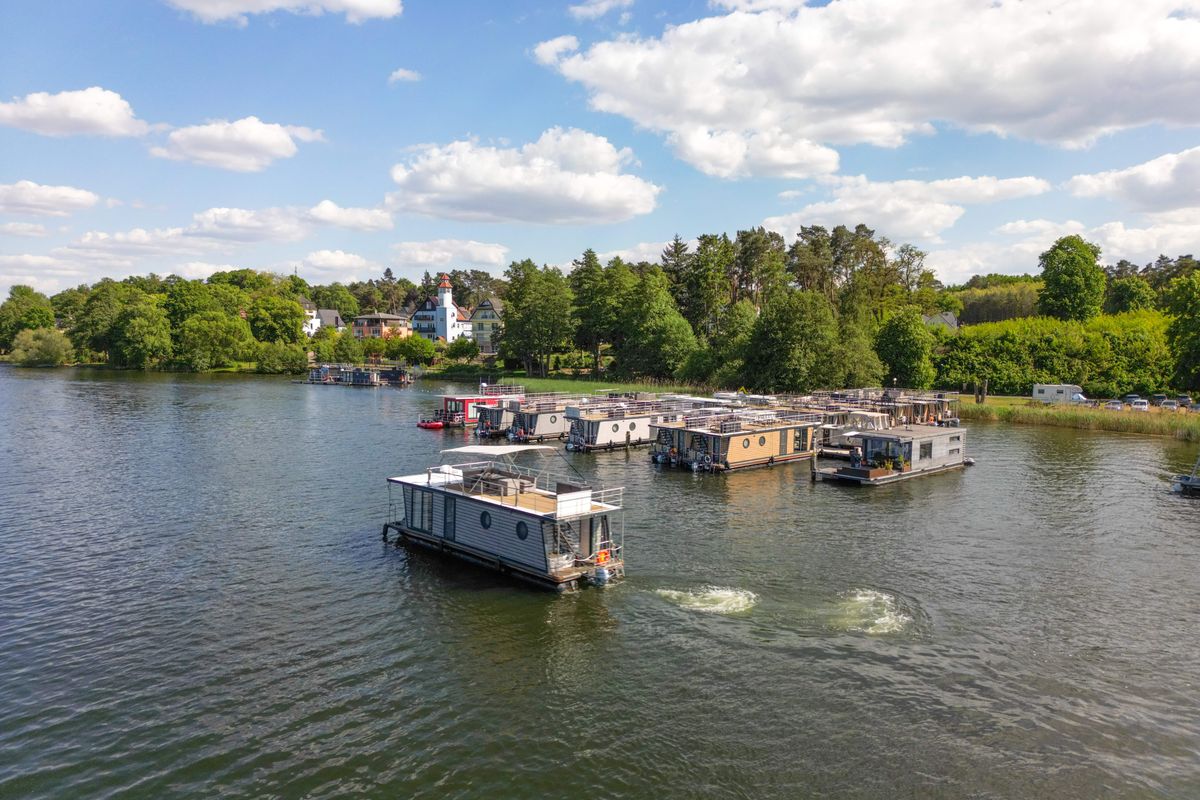 Exterior view of Miami, a Woma D13 motorboat at Fürstenberg/Havel, Germany
