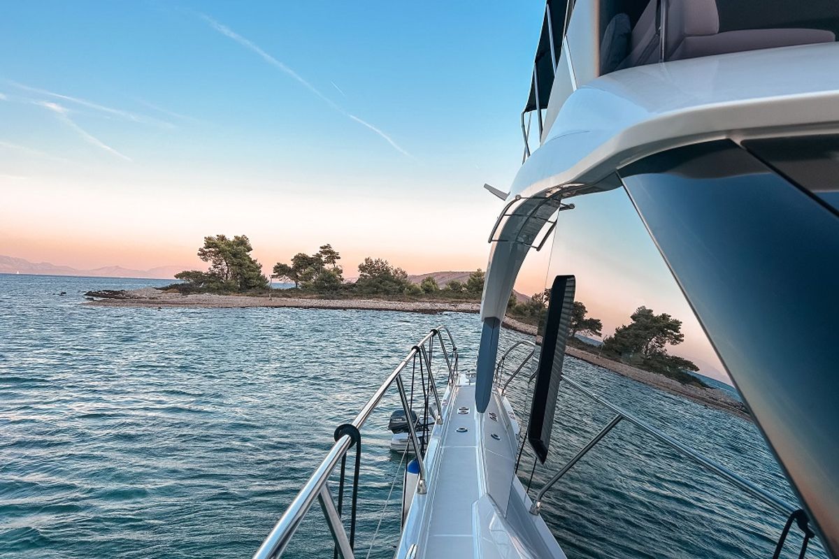 Exterior view of Nora, a Beneteau Monte Carlo 52 motorboat at Seget Donji, Croatia