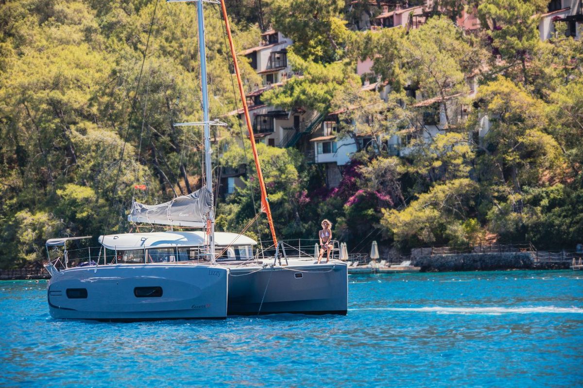 Exterior view of Lizzy, a Excess 11 - 4 + 1 + 1 cab. catamaran at Fethiye, Turkey